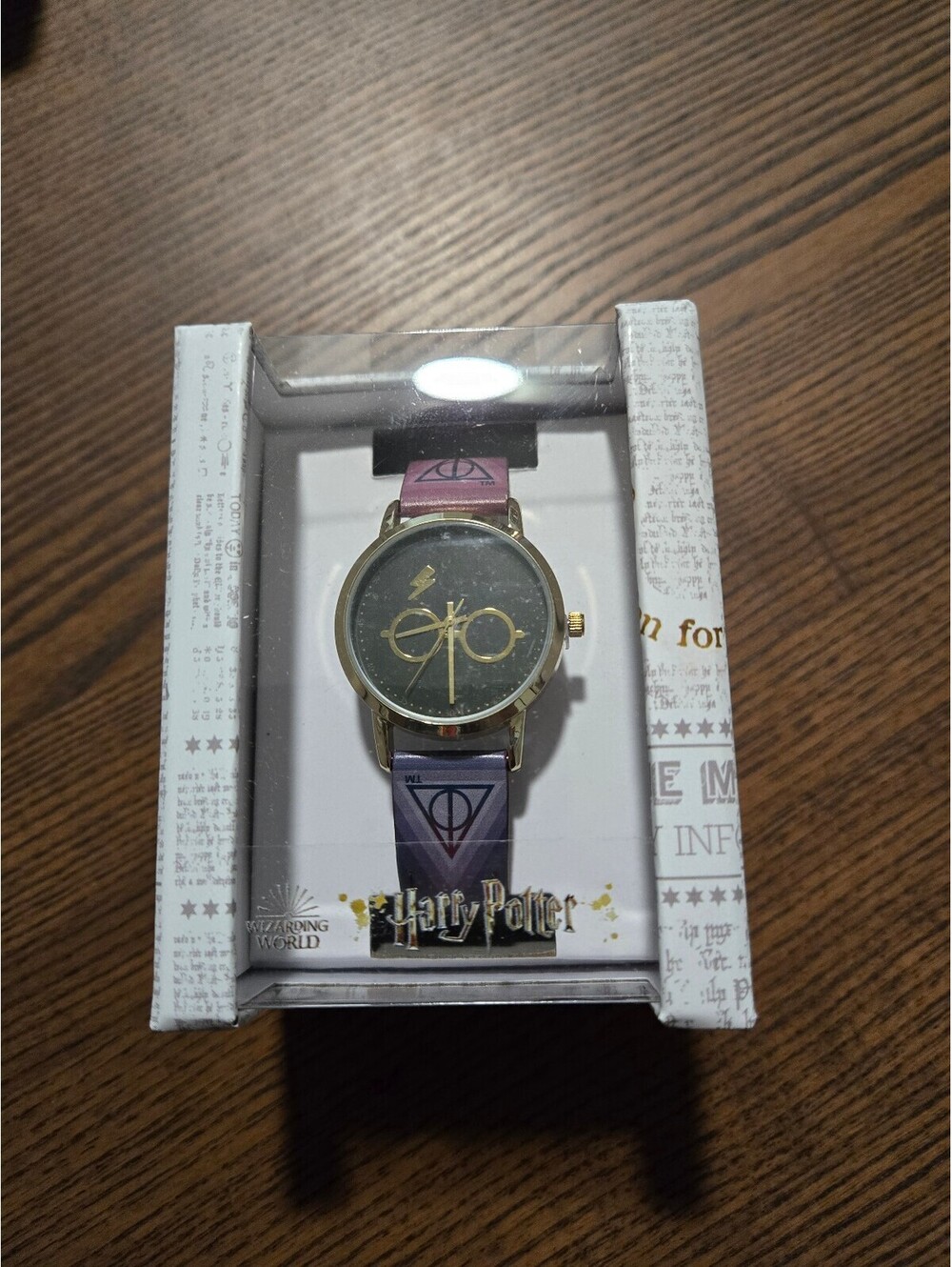 Harry Potter Wristwatch with Gold Tone Case and Purple Band